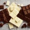 White vs Milk Chocolate on grey background