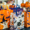 Halloween-themed bags featuring festive designs, perfect for gifting to coworkers during the Halloween season