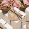 Wedding favors featuring chocolate treats with elegant thank you tags for guests