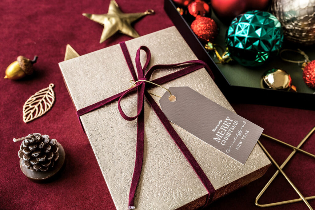 Christmas holiday business gift tied with a bow.