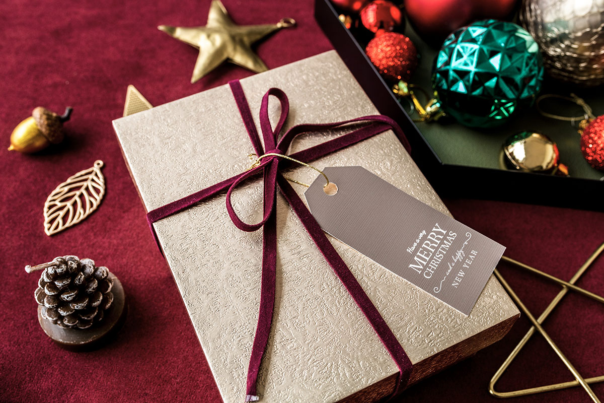 Christmas holiday business gift tied with a bow.